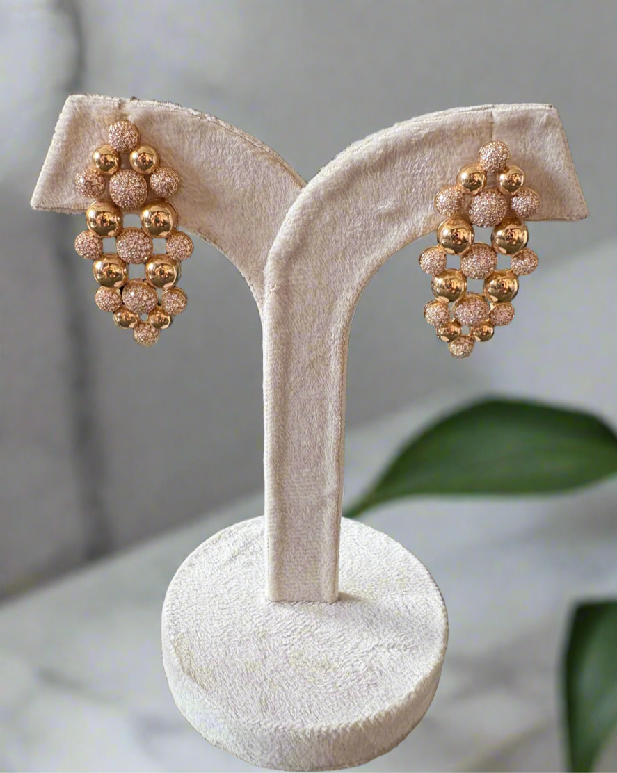 Gold plated statement earrings