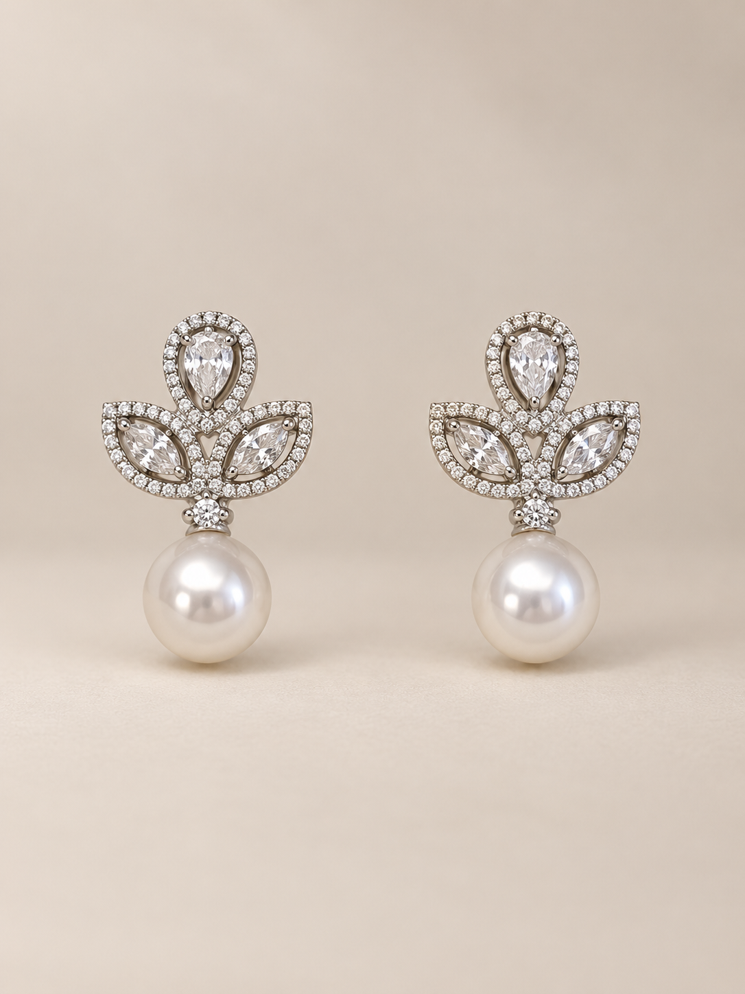 Pearl drop diamond earrings