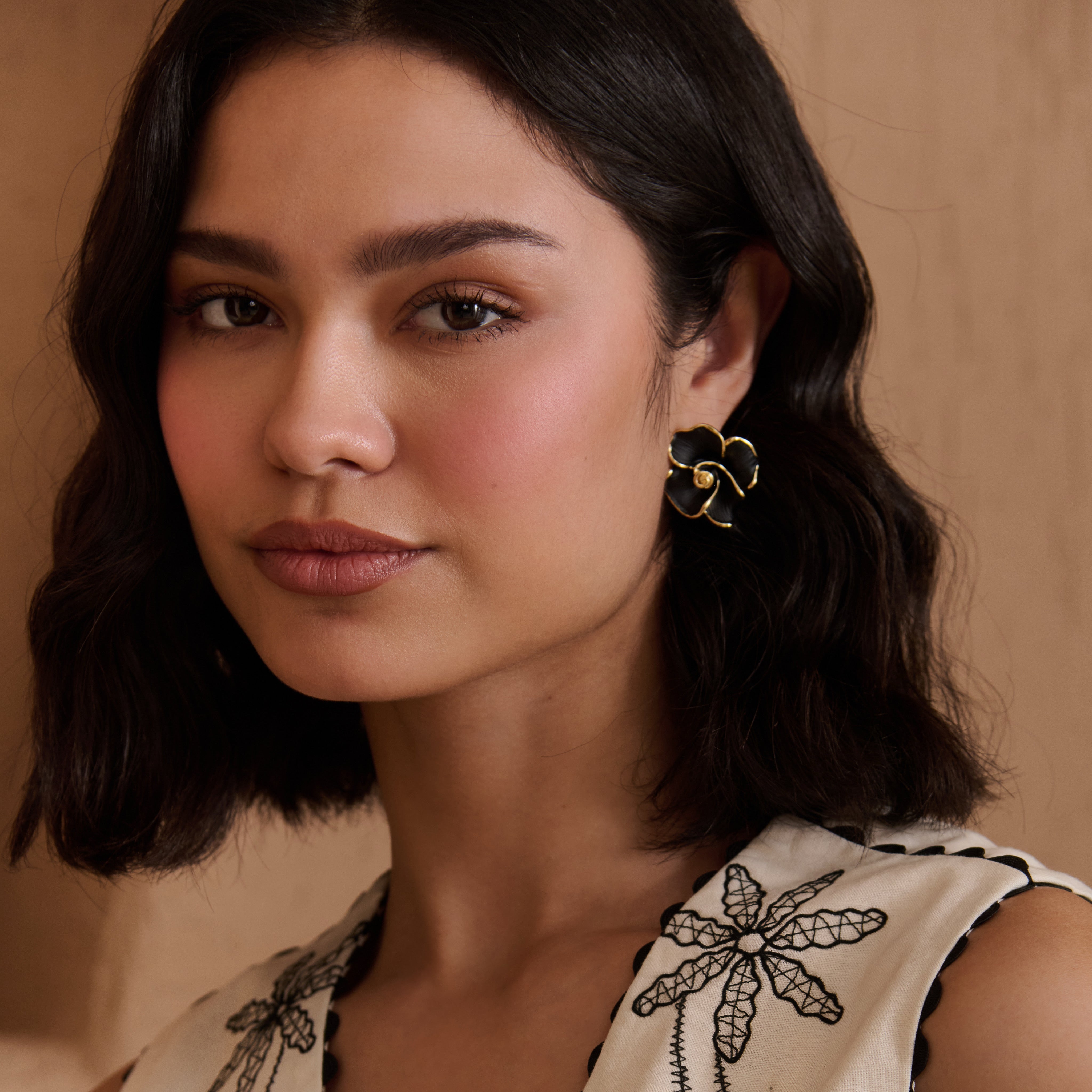 Black gold plated flower studs