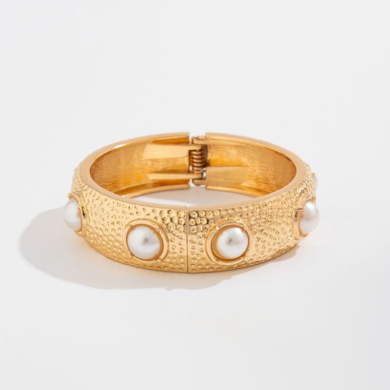 Pearl statement gold bracelet