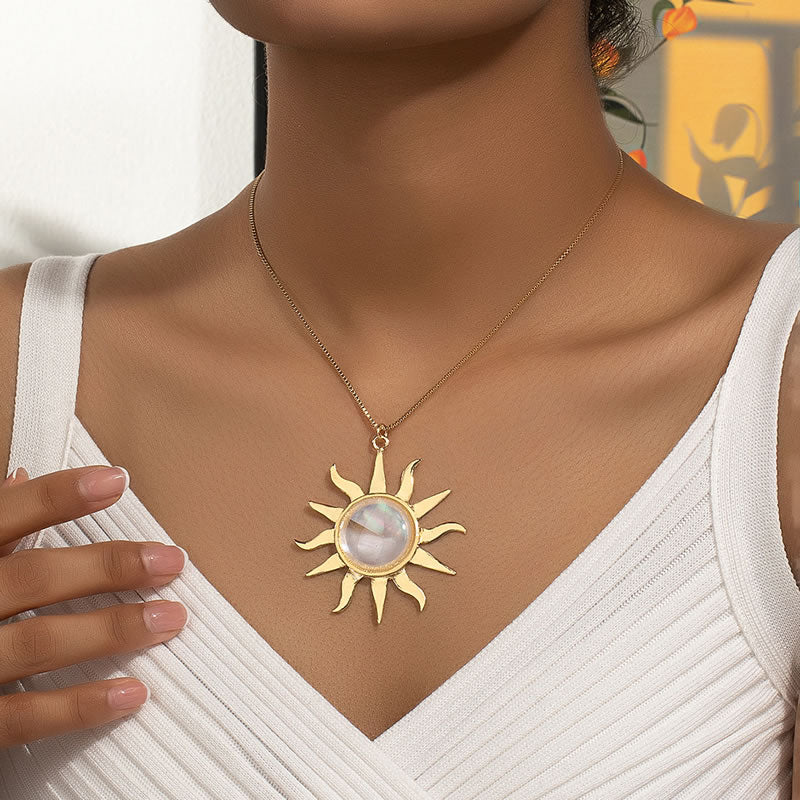 Gold statement sun pendant