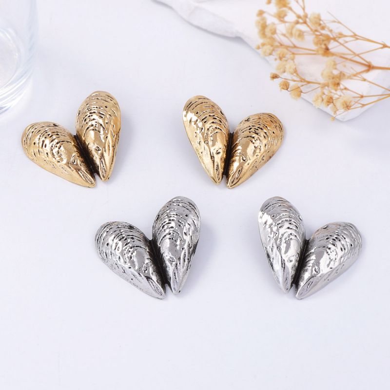 Silver statement heart earrings
