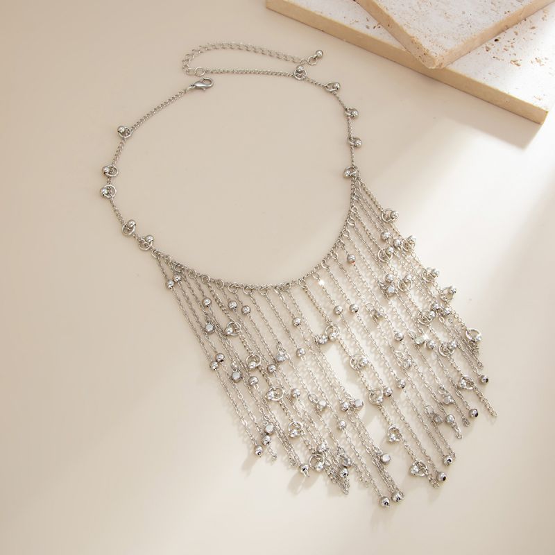 Silver tassel statement neckpiece