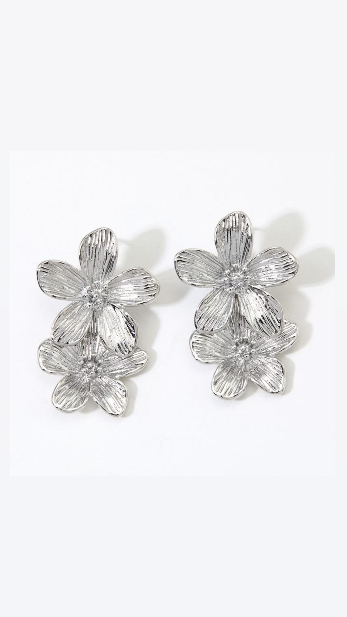 Silver flower statement earrings