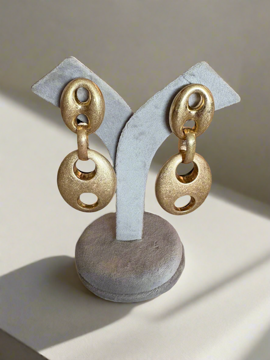 Gold link statement danglers