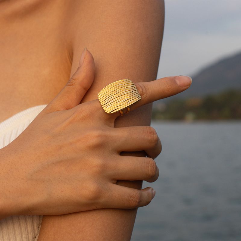 Textured studs with statement ring
