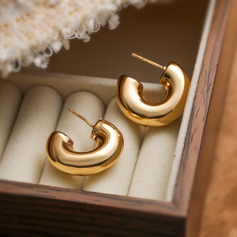 Gold C shaped studs