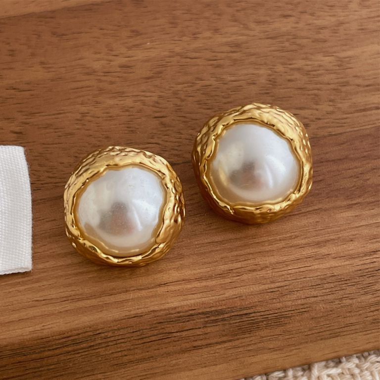 Pearl gold statement studs