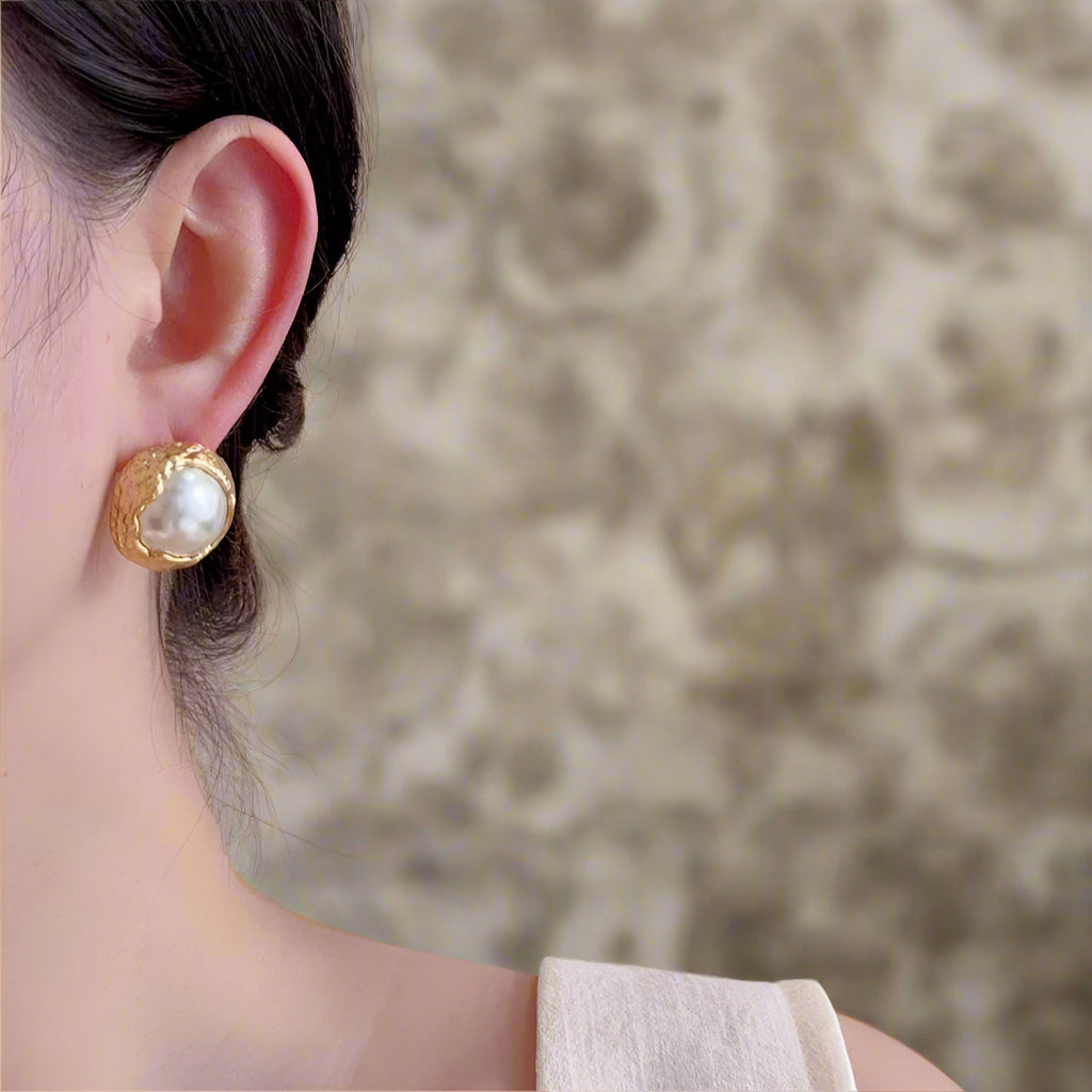 Pearl gold statement studs
