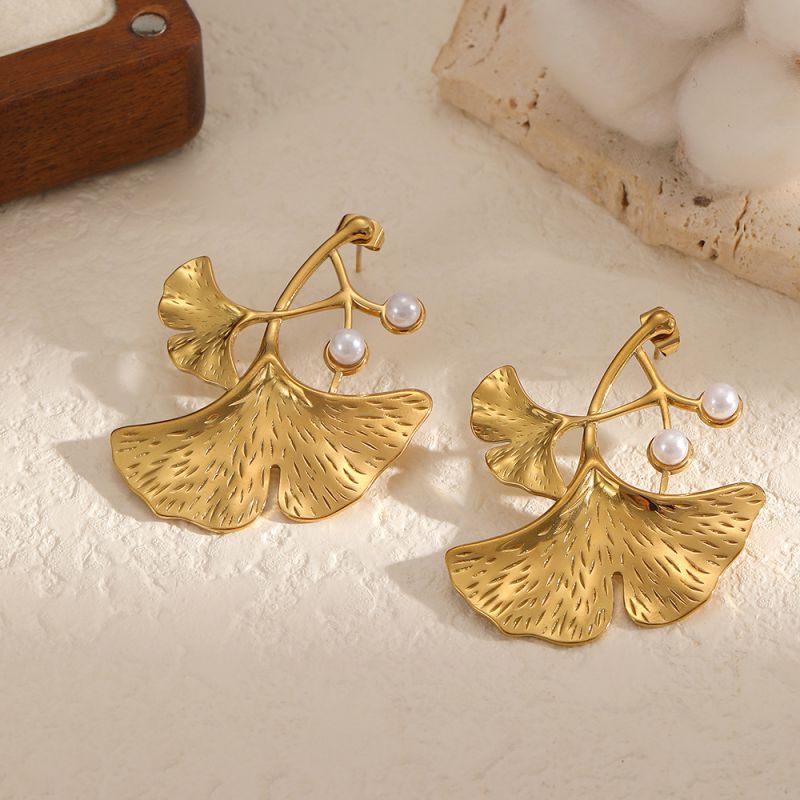 Gold plated pearl leaf statement earrings