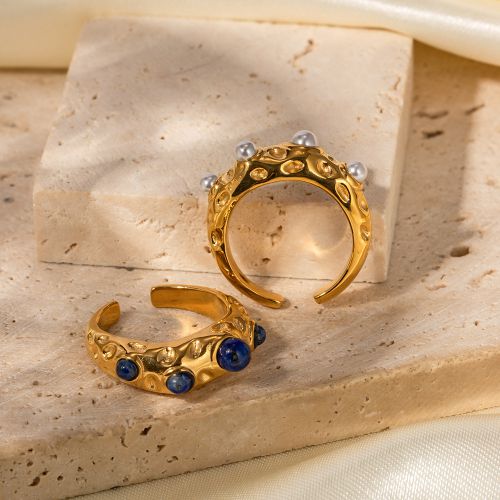 Geometric open ring in pearl & blue stone