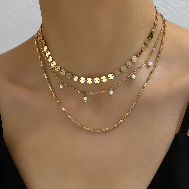 Three layer gold neckpiece