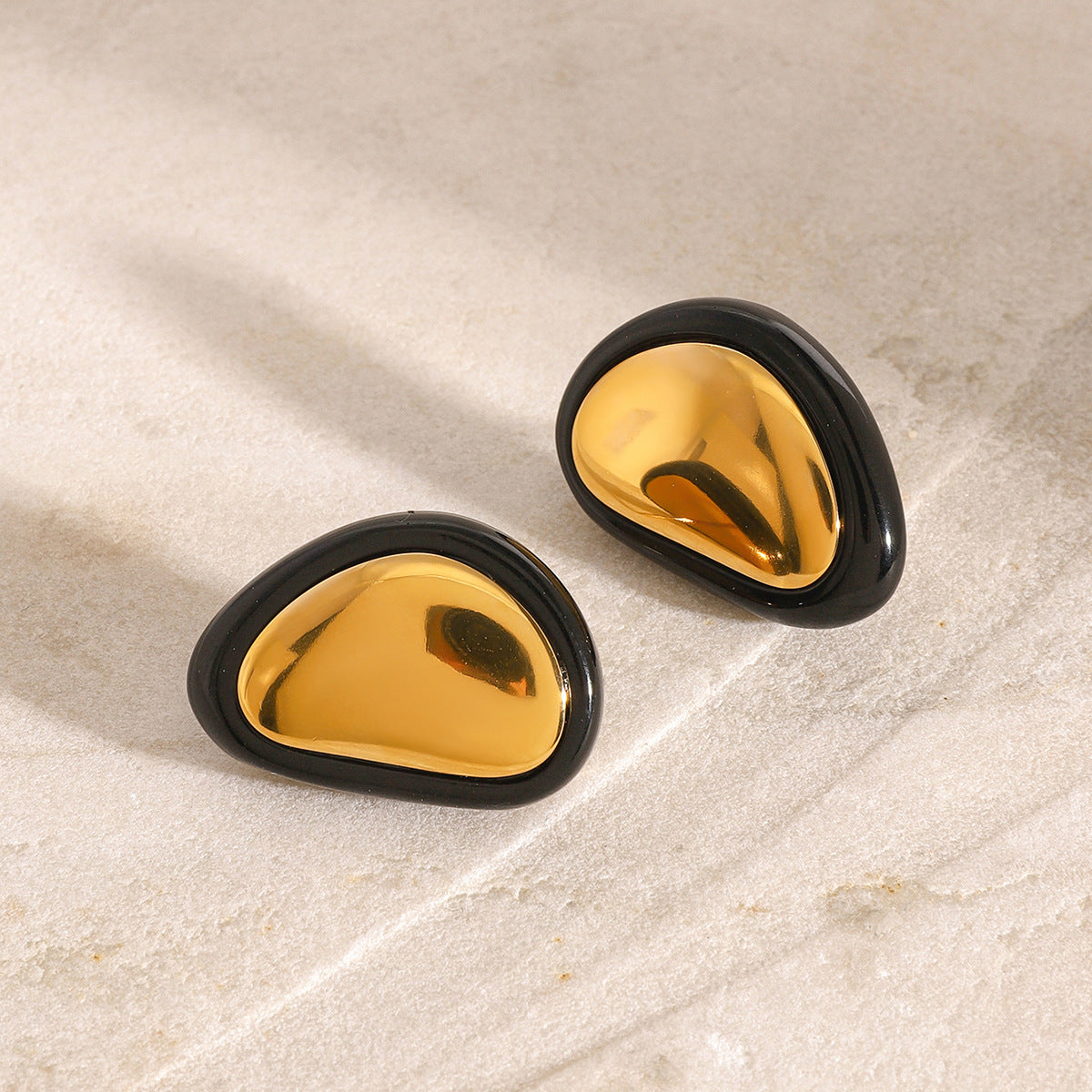 Black & gold studs