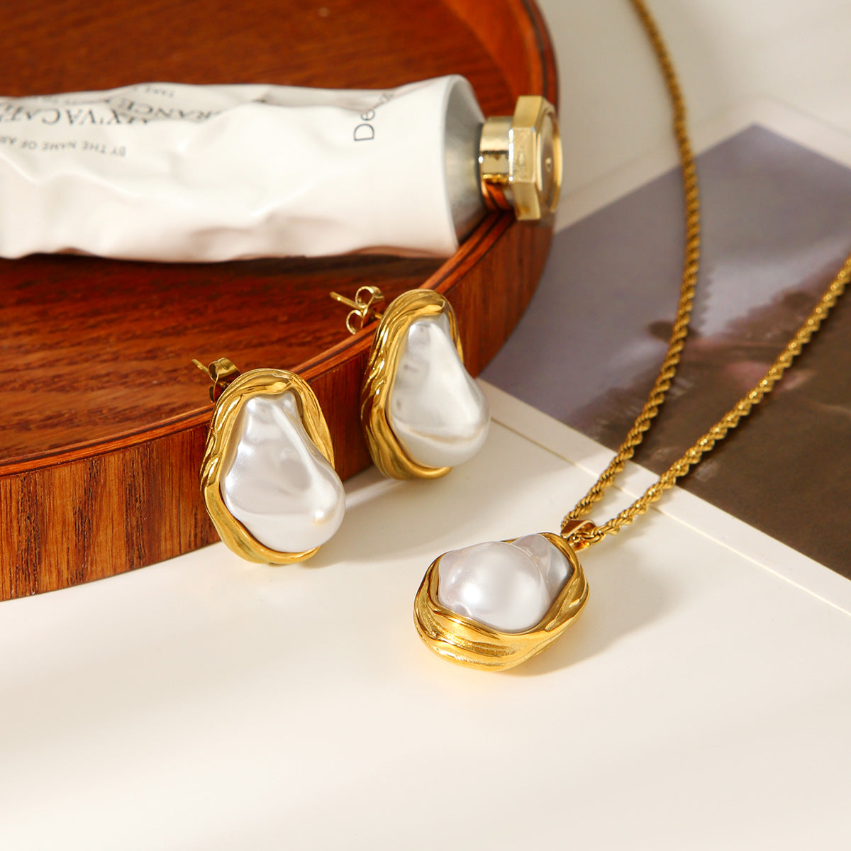 Baroque pearl gold detail studs