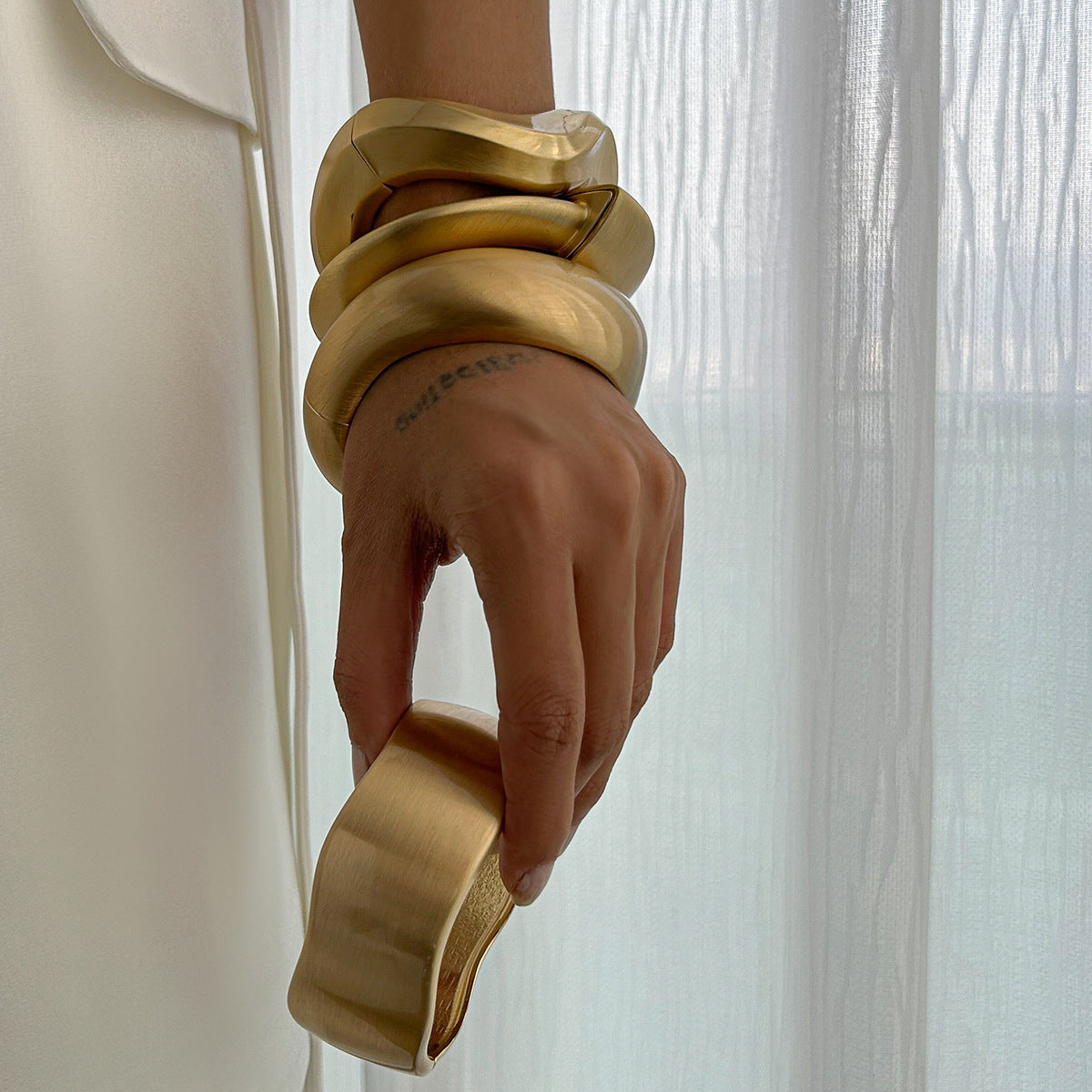 Sweep Gold plated statement bracelet