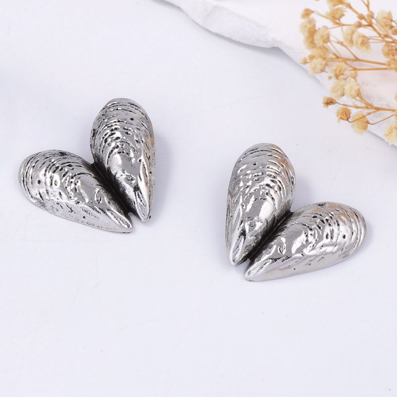 Silver statement heart earrings